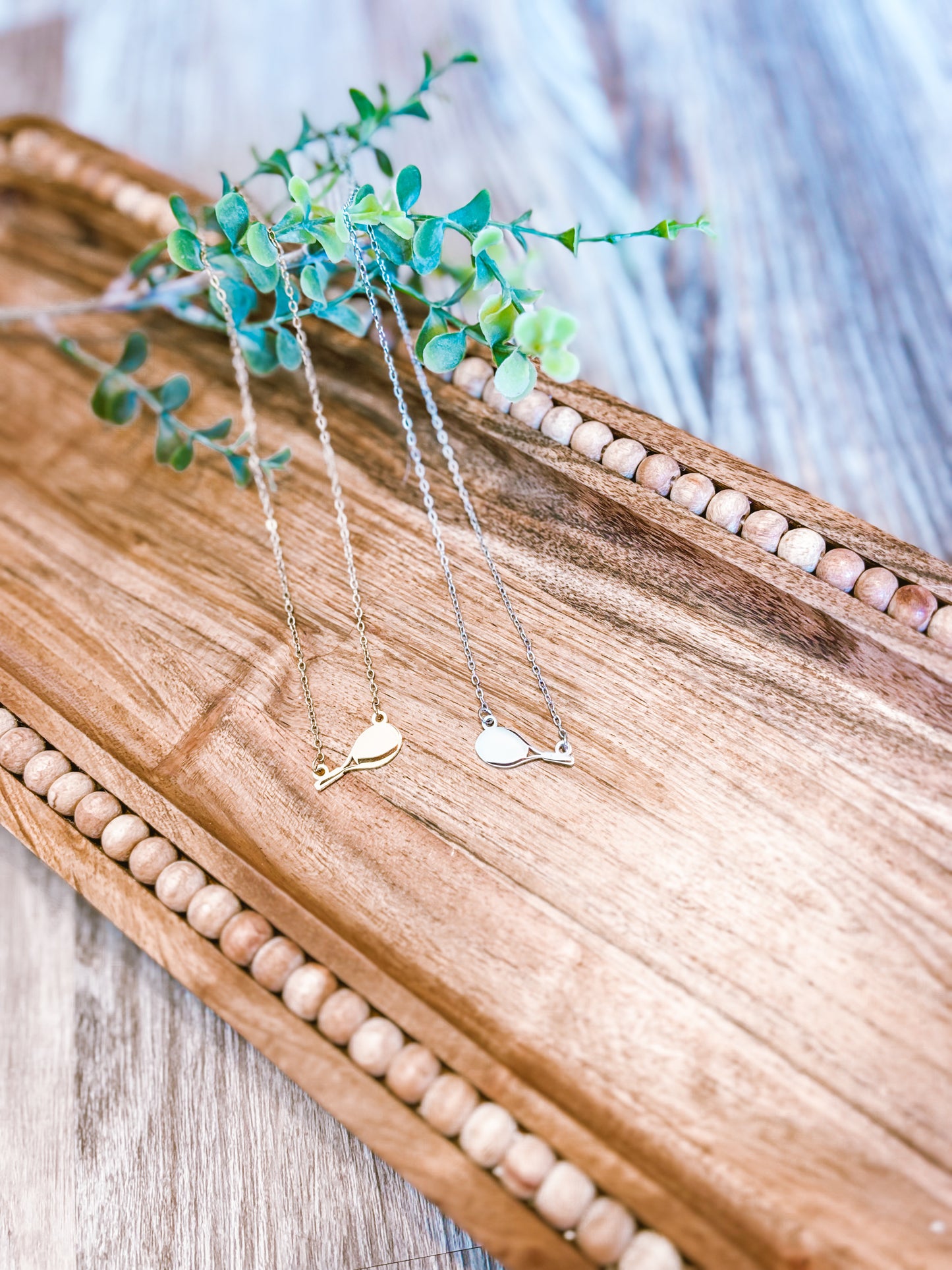 Tennis racket necklace